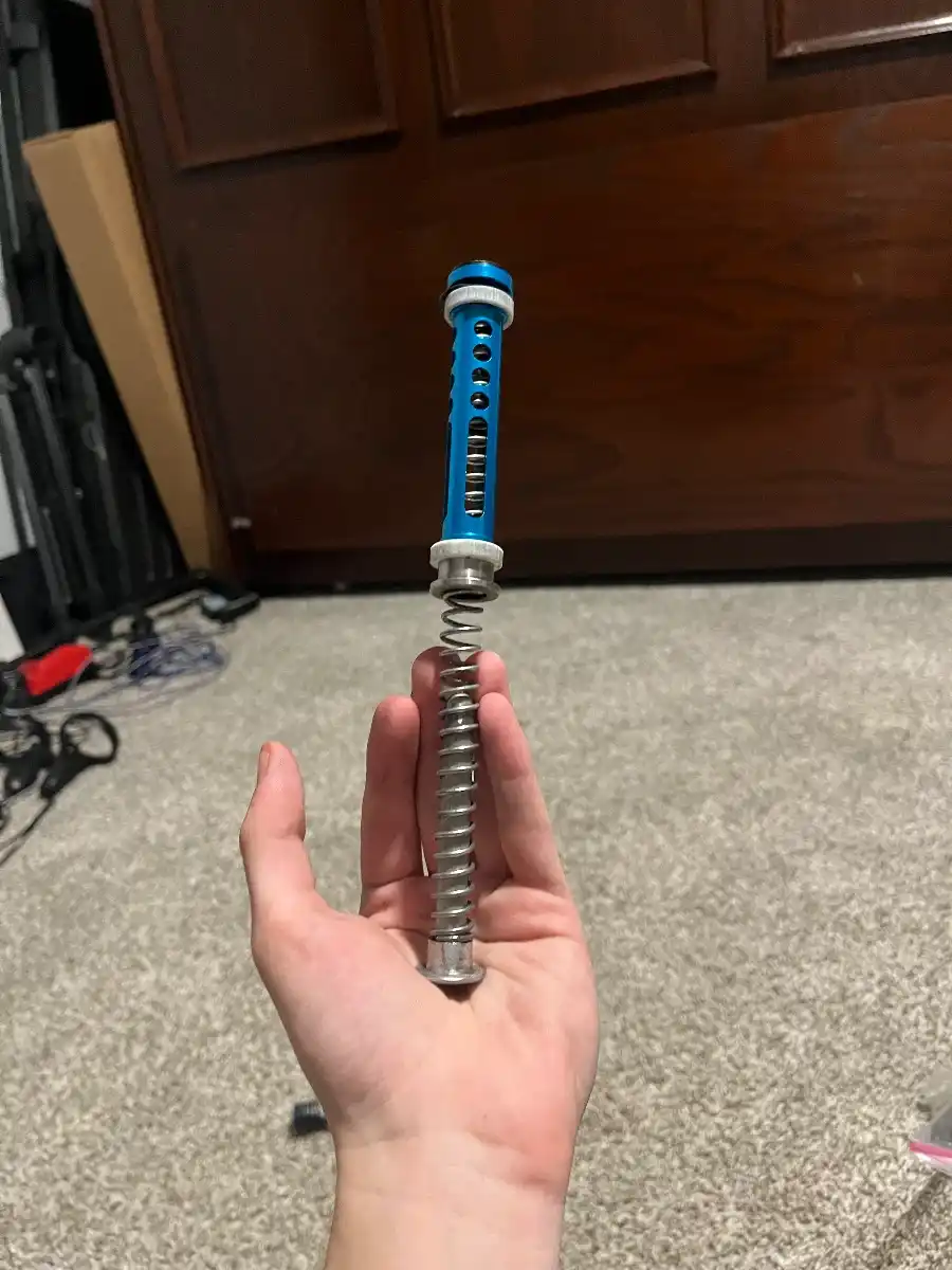 Action army piston, spring guide, and spring