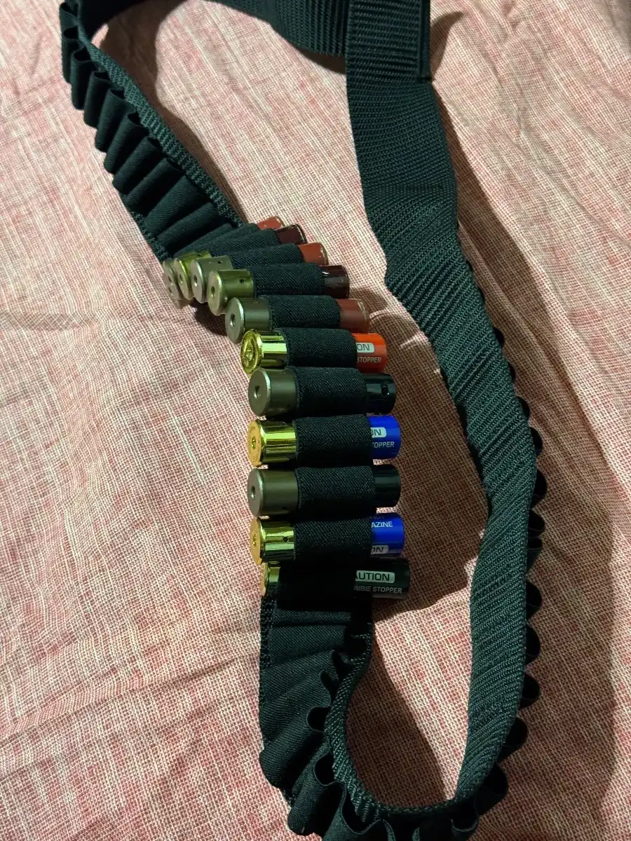 Shotgun shell Bandolier w/ some shells